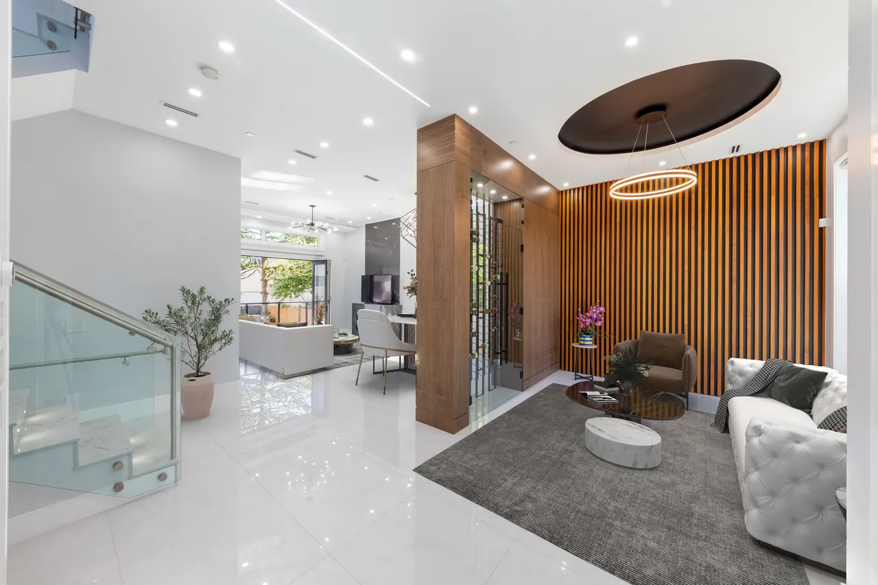 Entry, wine room and living area at Mayfair Ave